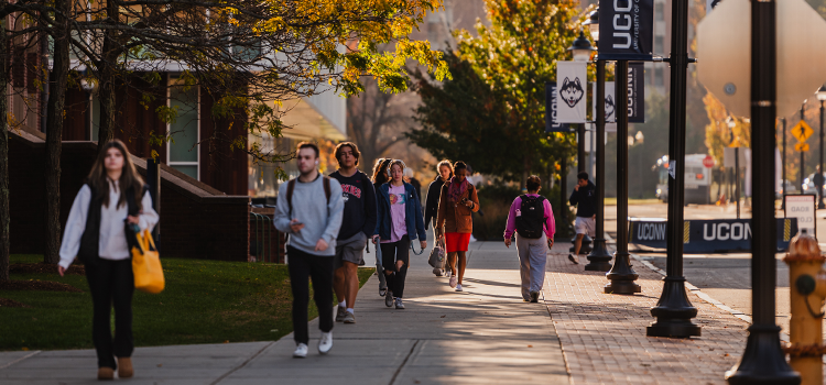 students walking on uconn campus